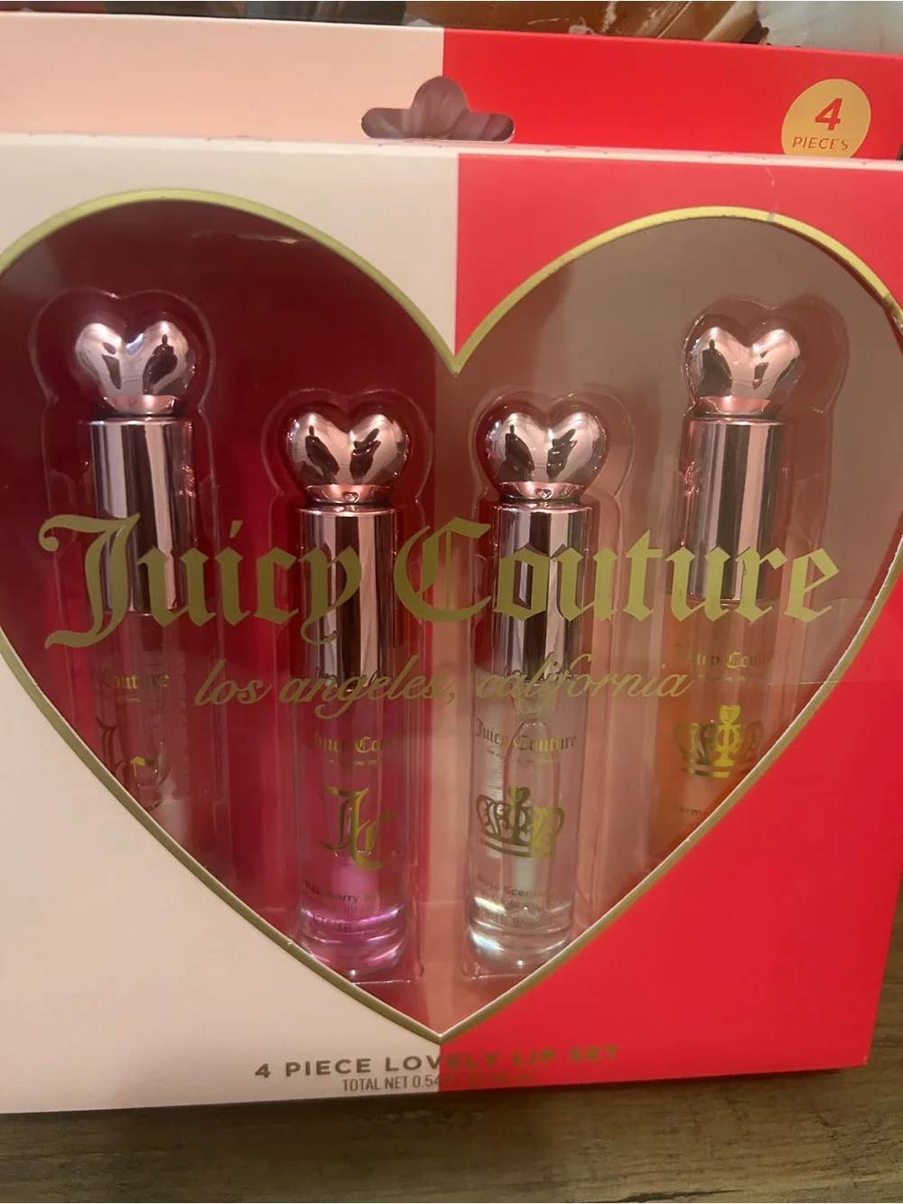 Juicy Couture 4 Piece Lovely Lip Oil Set